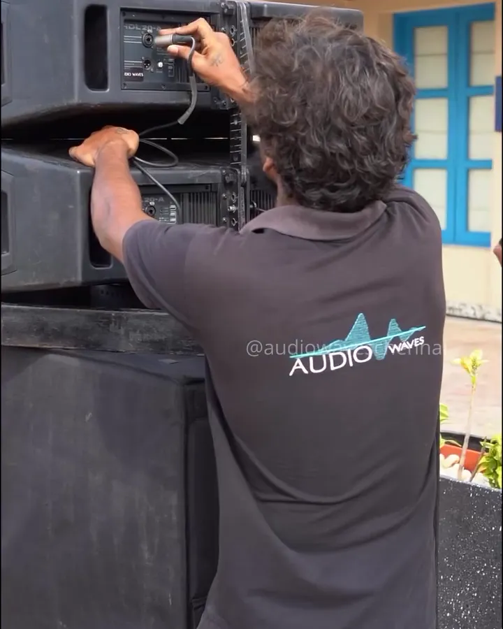 AudioWaves crew rigging speakers on the Lava Grill rooftop