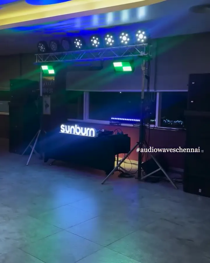 DJ booth with Sunburn branding under blue and red lights at Four Points Mahabalipuram