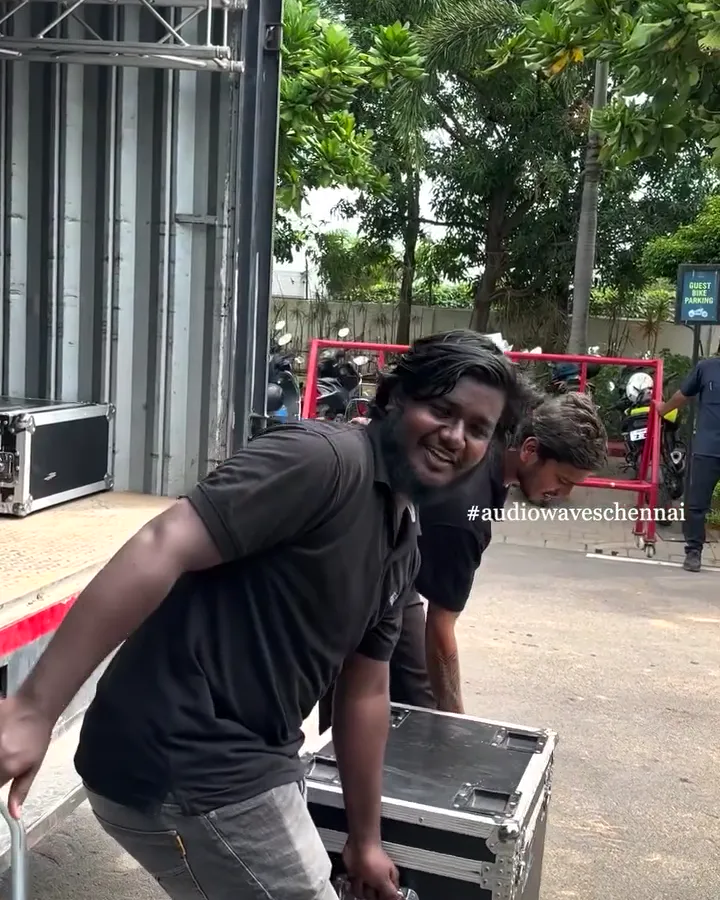 AudioWaves crew unloading flight cases from the truck