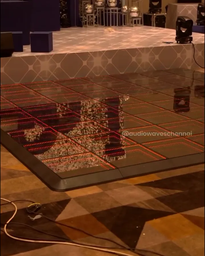 3D dance floor panels laid out in the banquet hall before the event